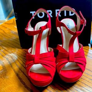 Size 7 NWT in box Torrid red straps platform shoes. Never worn outside